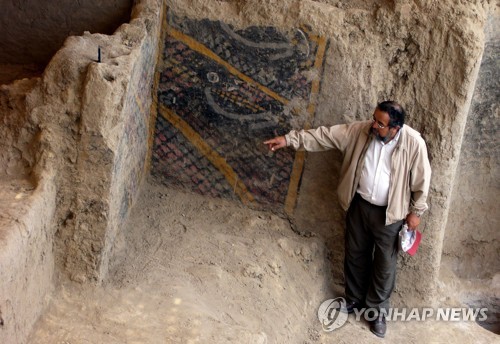기원전 2000년에 그려진 페루 고대 벽화 화재로 훼손