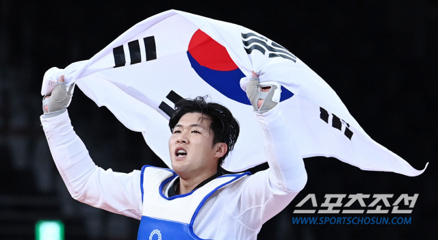 암을 이기고 따낸 불굴의 동메달 태권도 인교돈 "인간승리다, 암환우들 힘…