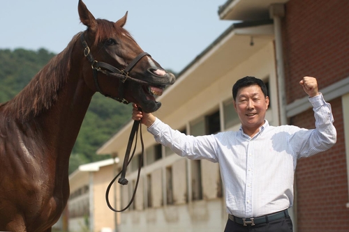 현대판 '백락' 김영관 조교사…한국 경마 첫 1천500승