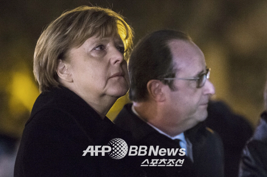 TOPSHOTS-FRANCE-GERMANY-ATTACKS-POLITICS-DIPLOMACY-GOVERNMENT