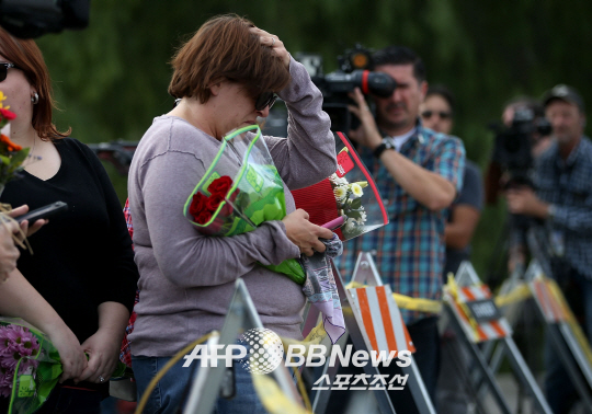 US-MASS-SHOOTING-IN-SAN-BERNARDINO-LEAVES-AT-LEAST-14-DEAD